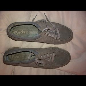Well worn Keds tennis shoes